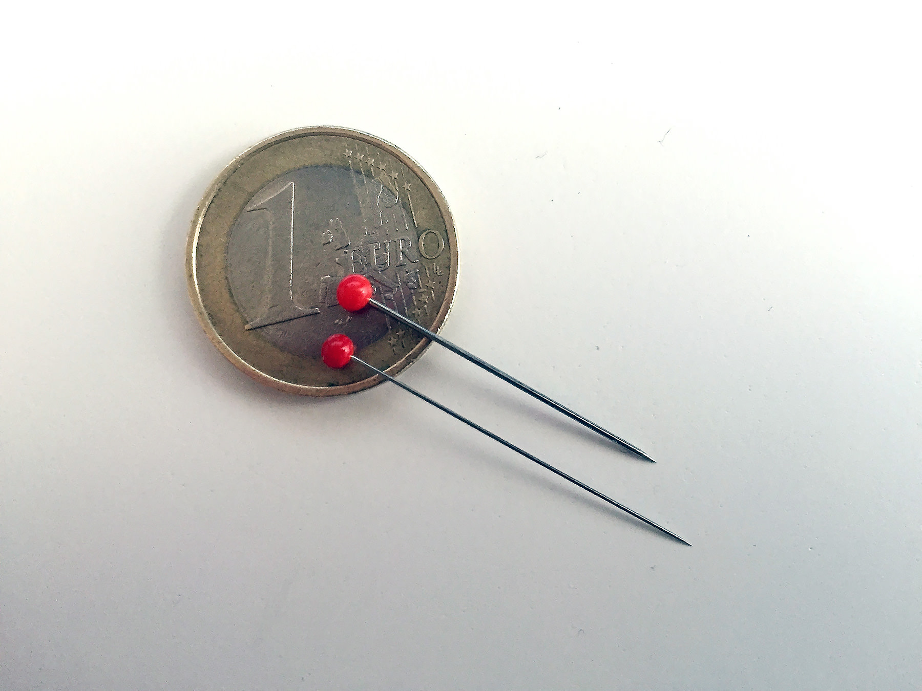 Standard pins versus thin pins.